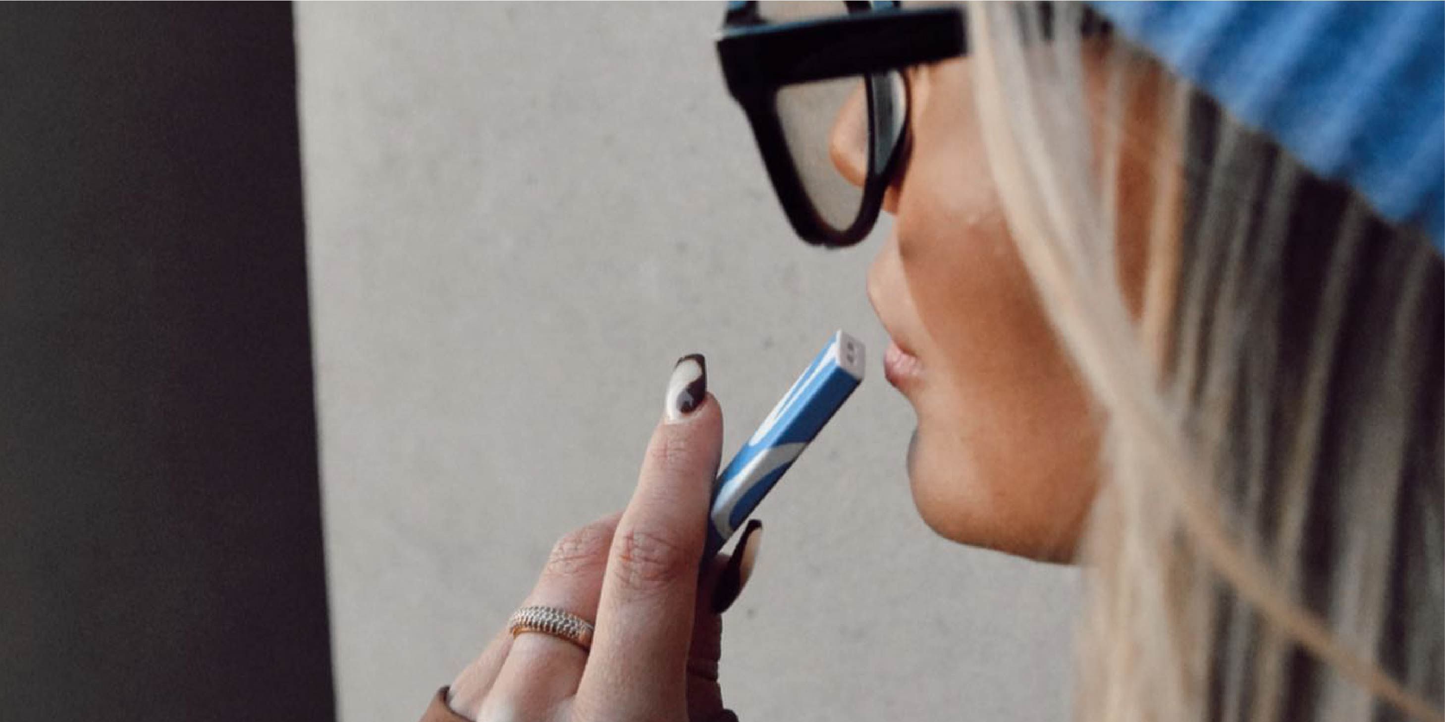Person using a disposable vape